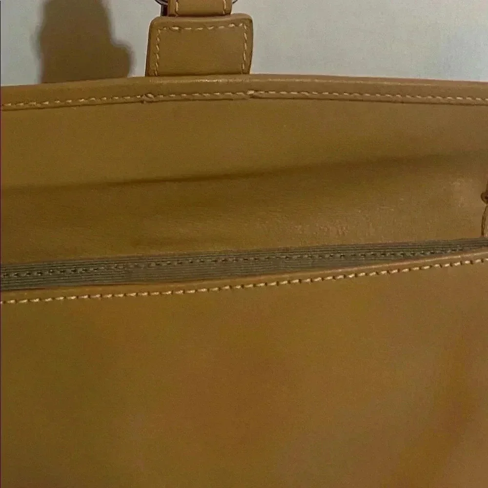 Coach vintage beige/ brown leather wristlet bag